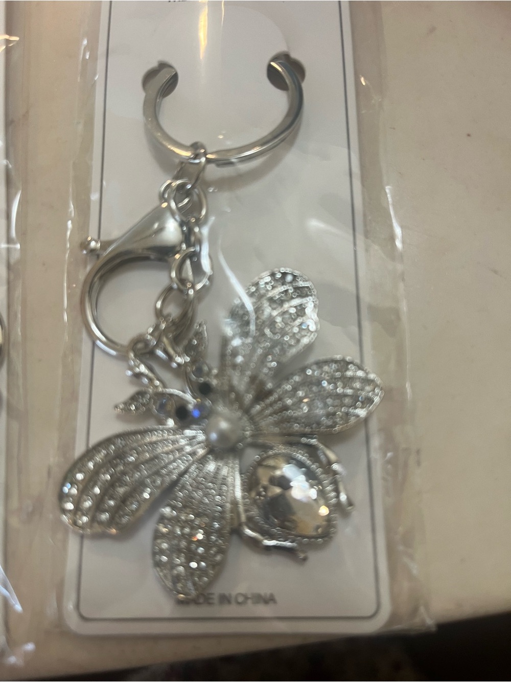Four sparkly silver tone key chains - Picture 5 of 5